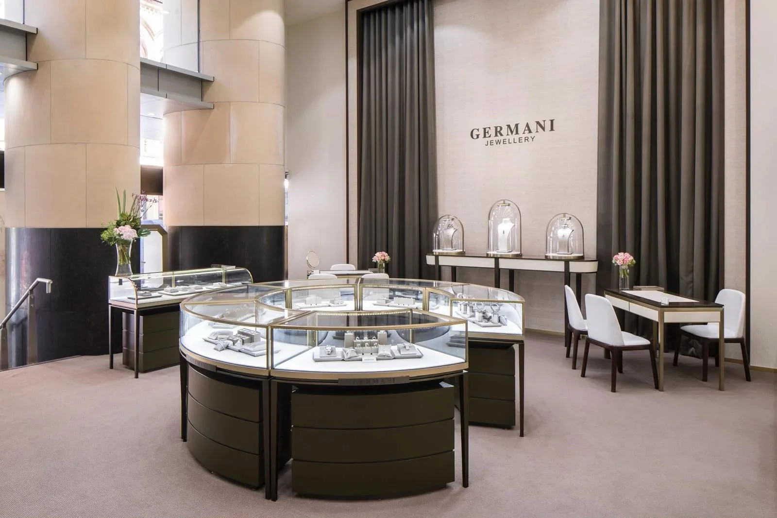 The Germani Jewellery showroom with a round showcase and glass domes